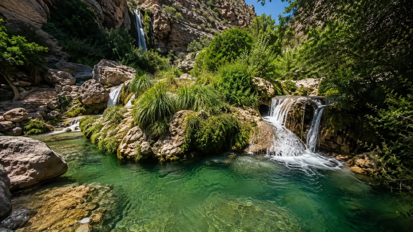 Vattenfall och naturliga bassänger vid Fonts de l’Algar